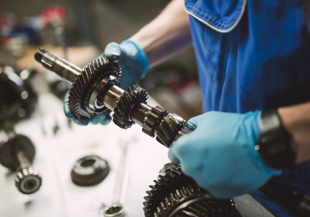 close-up-of-mechanic-working-on-the-parts-of-a-car-2024-09-16-11-09-58-utc